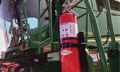 Fire extinguisher on combine