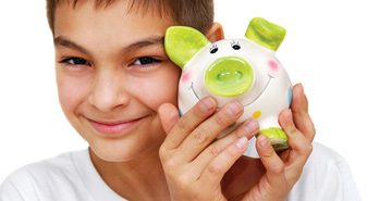boy with green piggy bank