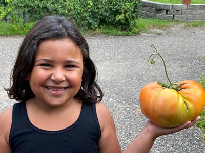 Girl with tomato
