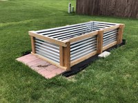 This newly constructed raised garden bed was made of galvanized metal and pressure-treated wood. (NDSU photo)