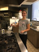 NDSU Extension summer intern Larissa Goncalves makes a traditional Brazilian dish. (NDSU photo)