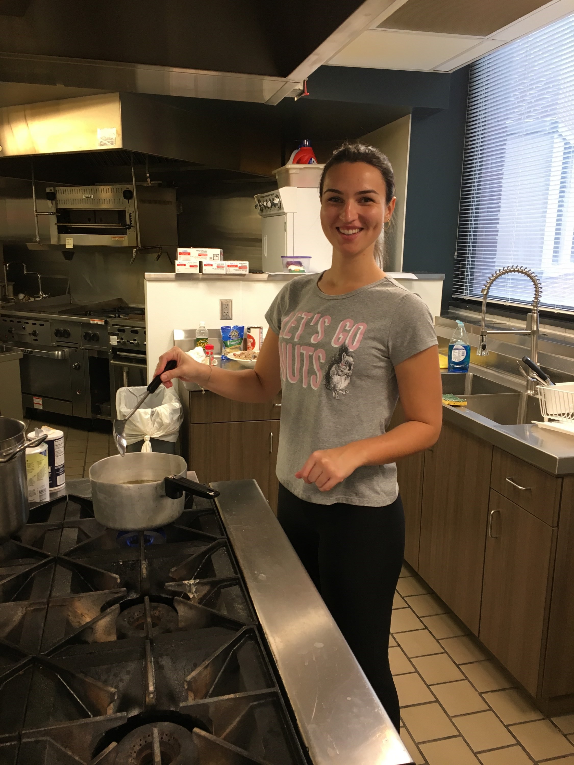 NDSU Extension summer intern Larissa Goncalves makes a traditional Brazilian dish. (NDSU photo)