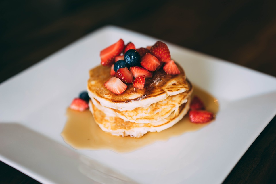 Pancakes are delicious with fresh fruits such as strawberries, which are in season in the spring. (Photo courtesy of Pixabay)