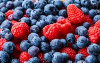 Raspberries and blueberries get their vibrant color from anthocyanin pigments, which may provide heart health benefits and reduce cancer risk. (Pixabay photo)