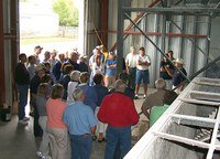 Producers tour the feed mill at the Carrington Research Extension Center.