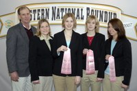 Adams County’s 4-H livestock judging team shows off its awards from the National Western 4-H Roundup. Pictured are (from left) team coach Dave Pearson, Adams County Extension agent Julie Kramlich and team members Kali Lueck, Caitlin Pearson and Jenny Johnson.
