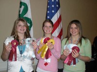 Benson County's 4-H hippology team shows off its ribbons from the Western National Roundup in Denver. Team members are (from left): Kristine Keller, Janna Rice and Sharisa Yri.