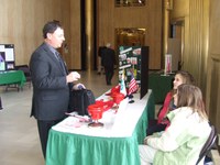 4-H members Jenny Zastawniak (front) and Rachel Funkhouser, both of Beulah, chat with state Sen. Randel Christmann of Hazen at a Citizenship in Action event in Bismarck.