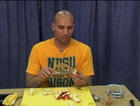 Bison basketball team member Freddy Coleman demonstrates how to make a quick, easy-to-prepare, healthful snack for kids.