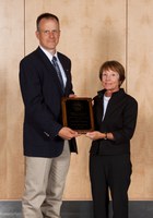 Greg Lardy, head of NDSU's Animal Sciences Department, receives the American Society of Animal Science's 2010 Extension Award during ceremonies in Denver.