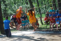 Youth take the Western 4-H Camp's Survivor Outdoor Recreation Camp mud-pit challenge.