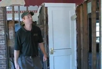 NDSU Extension area specialist Daniel Waldstein shows how to clean a flood-damaged home.