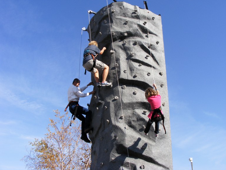 People test their skills on a climbing wall during the Rural Renaissance Festival in Maddock. A Rural Leadership North Dakota participant came up with the idea of a fall festival to draw attention to Maddock as a great place to live and to boost the community's economy.