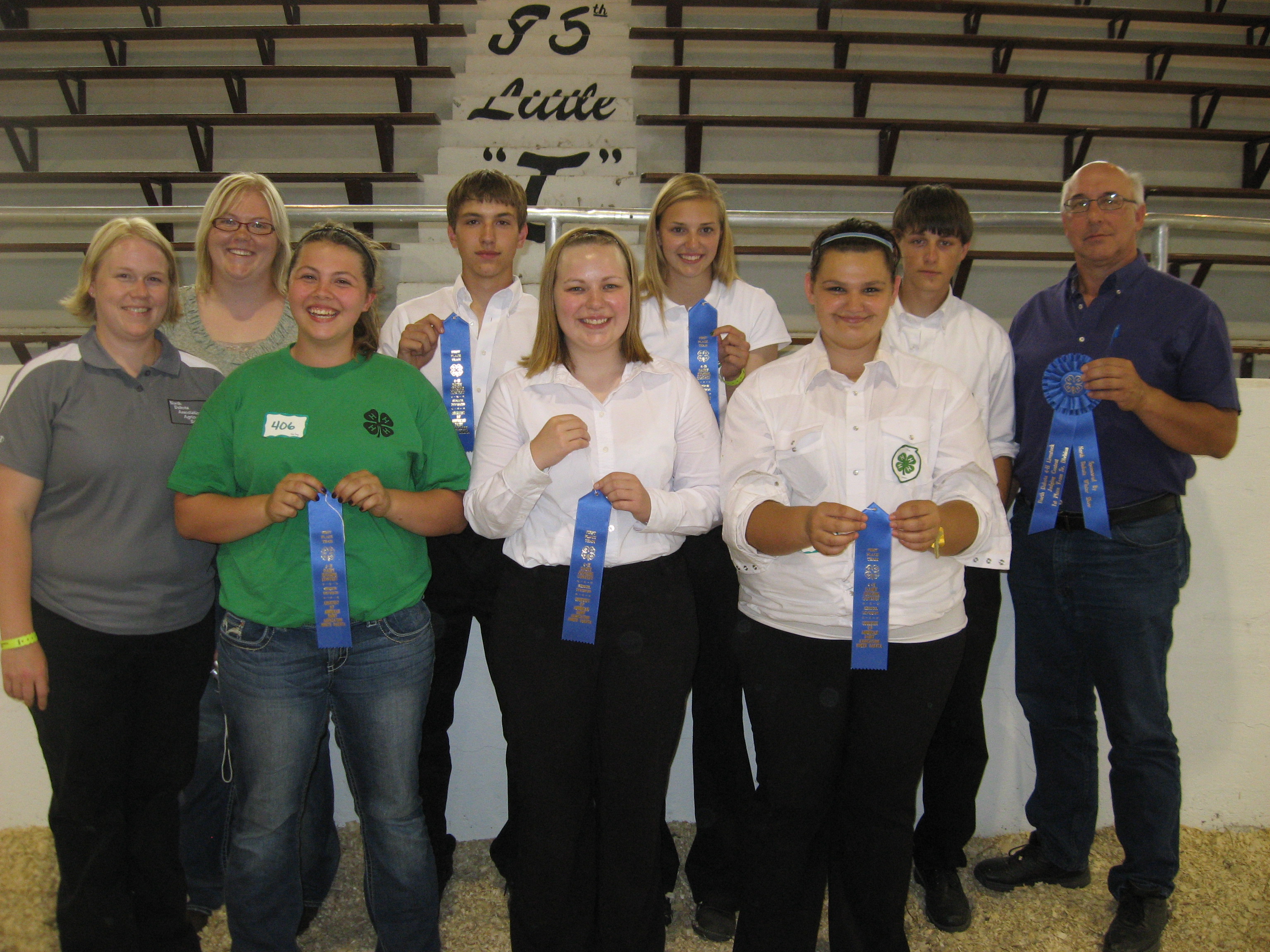Foster County's 4-H dairy judging team placed first in the senior division of the state 4-H dairy judging contest. Pictured are (back row, left to right): Jenny VandeHoven, coach; team members Casey Murphy, Madison Wendel and Seth Hazer; and Joel Lemer, coach; (front row, left to right): Missy Hansen, coach; and team members Haley Koenig, Maggie Mattson and Shawna Fetch.
