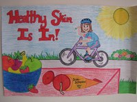 Kaitlyn Grossman of Bismarck receives second place in the teen division of the 2012 ""Eat Smart. Play Hard."" poster contest.