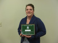 Carrie Knutson, a Grand Forks County agent, receives the National Association of Extension 4-H Agents' Achievement in Service Award.