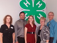Lavina Domagala of Williston (second from right) is inducted into the North Dakota 4-H Hall of Fame in Minot. She is accompanied by (from left) North Dakota 4-H Foundation President Maureen Ming, son-in-law Andy Staloch, daughter Shauna Staloch and husband Allen Domagala.