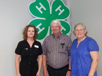 North Dakota 4-H Foundation President Maureen Ming (left) recognizes Fred and Bette Jane Boeshans of Beluah as North Dakota 4-H Foundation scholarship donors. They were honored during a recognition program in Minot.