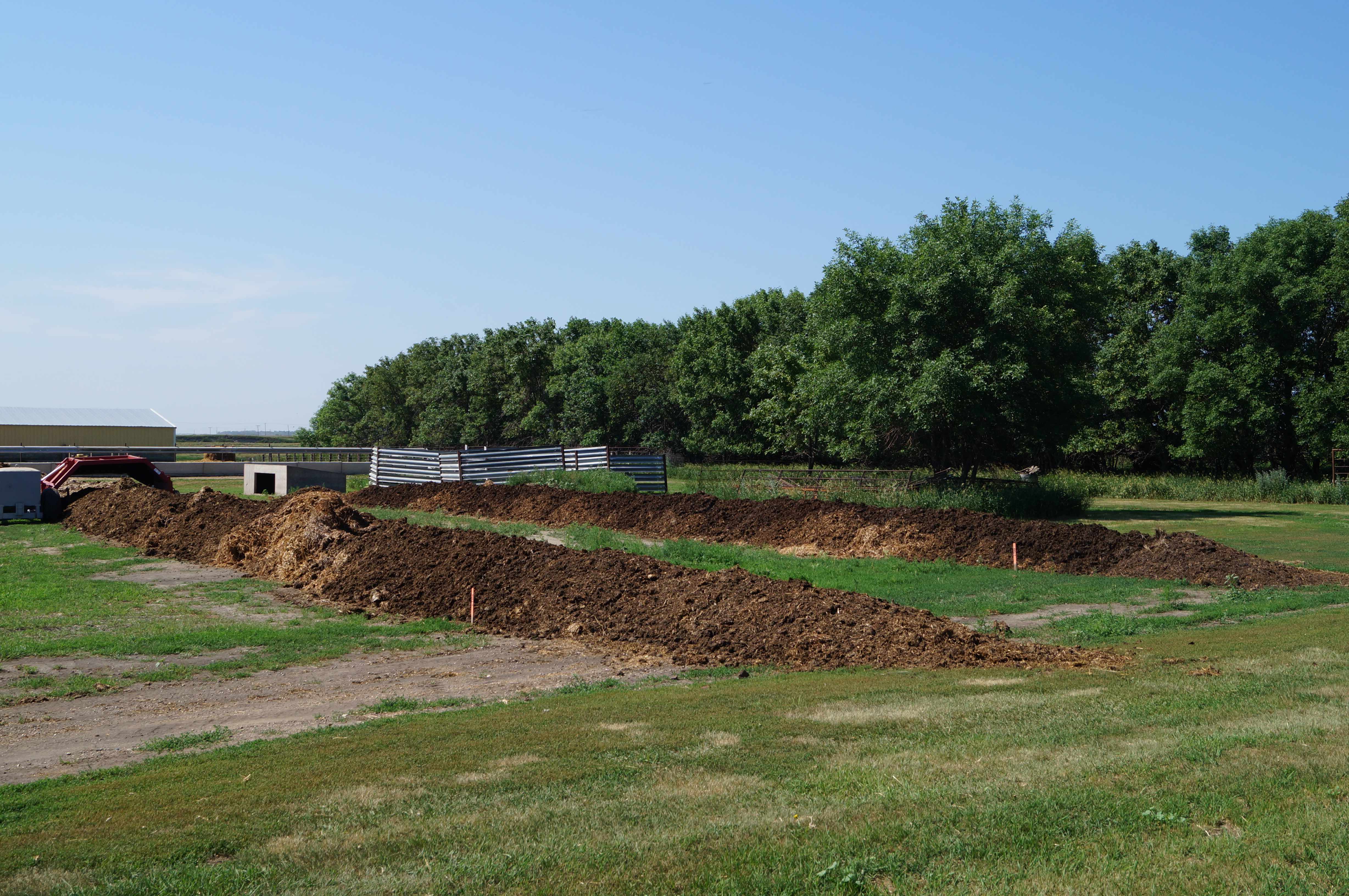 These piles are the result of efforts at the Carrington Research Extension Center to convert manure into composted material.
