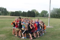 Youth have fun while taking part in a team-building activity at the North Dakota 4-H Camp near Washburn.