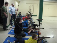 Youth compete in the junior division of the state 4-H air rifle match in Devils Lake.