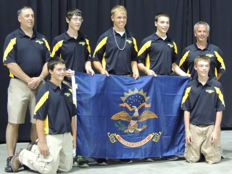 The North Dakota 4-H shooting sports team places 11th overall at the National 4-H Shooting Sports Invitational in Grand Island, Neb. Pictured are (back row, from left): Coach Greg Eider, team member alternate Blake Hensley, team members Quaid Larsen and Skyler Bitz, and Coach Jeff Ellingson; (front row, from left): team members Jacob Ellingson and Jade Ellingson.