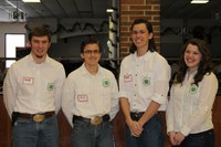 The Grand Forks County team placed first in the senior division of the crop judging contest at the North Dakota Winter Show. The team members are Daniel Kraemer (far left), Jacob Granger (second from right) and Sarah McNaughton (far right). Thomas Granger (second from left) is a member of combined Grand Forks/LaMoure County team that placed first in the junior division.