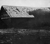 Soil dunes over a barn in Kidder County (1939). N.D. State Archives image.