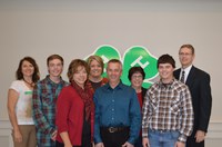 Jeff Ellingson, who received a 4-H volunteer of the year award, is surrounded by family and friends. Pictured are: (front row) Jenny Ellingson, Jeff Ellingson and Jacob Ellingson; (back row) Leann Schafer, North Dakota 4-H Foundation board chairwoman; Jade Ellingson; Karla Meikle, Extension agent, Morton County; Jackie Buckley, Extension agent, Morton County; and NDSU Extension Service Director Chris Boerboom.
