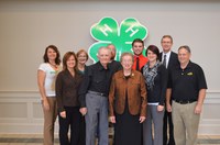 Phyllis Otterness, who was honored with a 4-H lifetime volunteer award, is surrouned by family and friends. Pictured are: (front row) Susan Milender-Toppen, Durward Otterness, Phyllis Otterness, Emily Brandt and Randy Grueneich, Extension agent, Barnes County; (back row) Leann Schafer, North Dakota 4-H Foundation board chairwoman; Laurie Schroeder; Duane Otterness; Zach Hochhalter; and NDSU Extension Service Director Chris Boerboom.