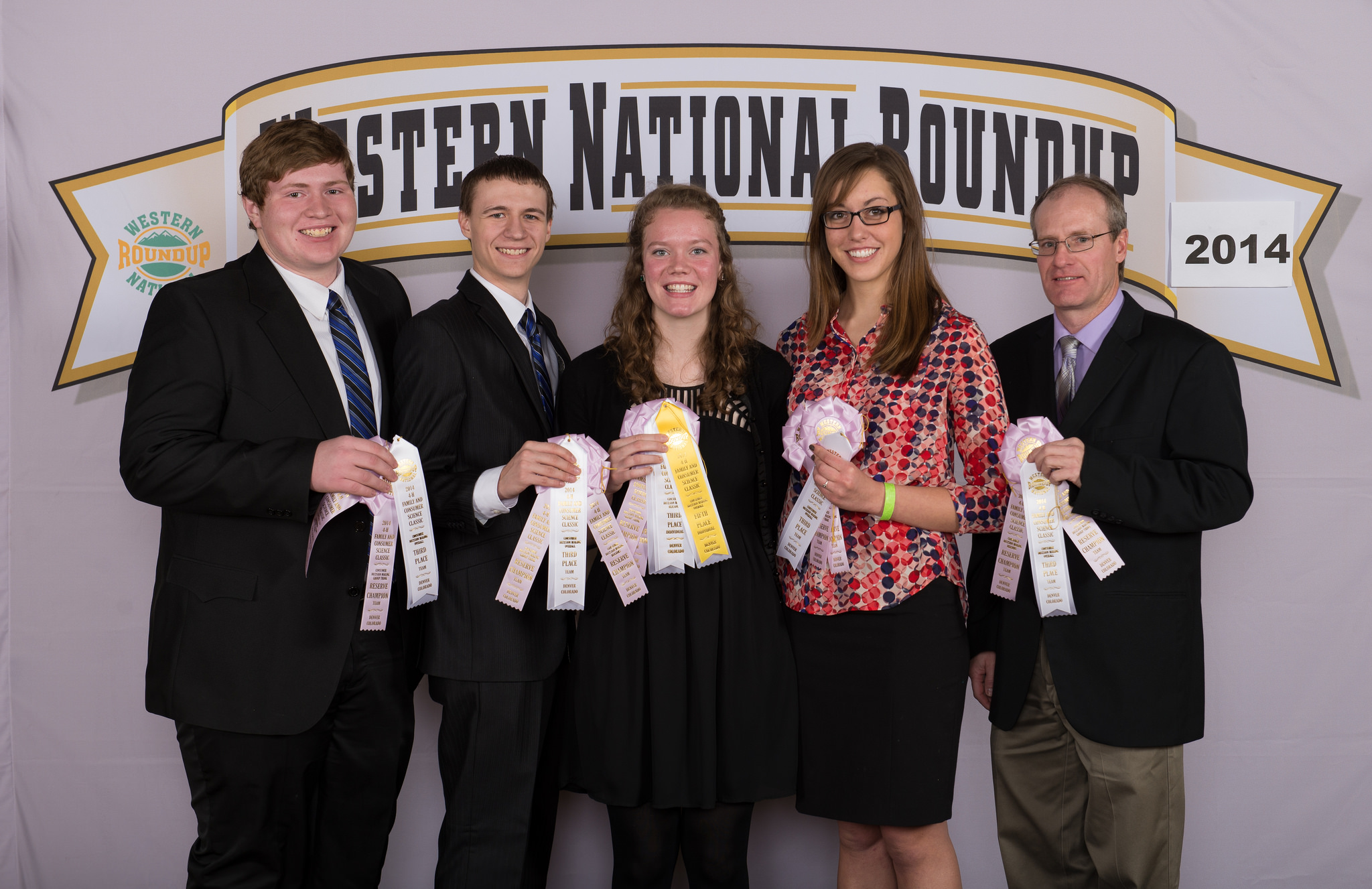 The Oliver County consumer choices team places third overall at the Western National Roundup in Denver, Colo. Pictured (from left) are team members Shane Giedd, Tanner Berger, Emily Klein and Rebecca Liffrig, and coach Rick Schmidt.
