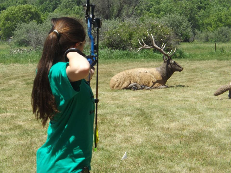 Alivia McCarthy of Ramsey County is taking a shot at a 3-D target during the 4-H Archery Shooting Sports State Match held at the North Dakota 4-H Camp near Washburn. (NDSU photo)