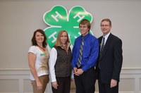 The Kermit and Marcy Hansen family was named a North Dakota 4-H century family. Pictured are, from left, Leann Schafer, chairwoman of the North Dakota 4-H Foundation board; Lynae Hansen-Lardy; Jarrett Lardy; and Chris Boerboom, NDSU Extension Service director. (NDSU photo)