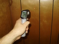 An infrared thermometer like this one can help you detect air leaks and cold spots in your home. (NDSU photo)
