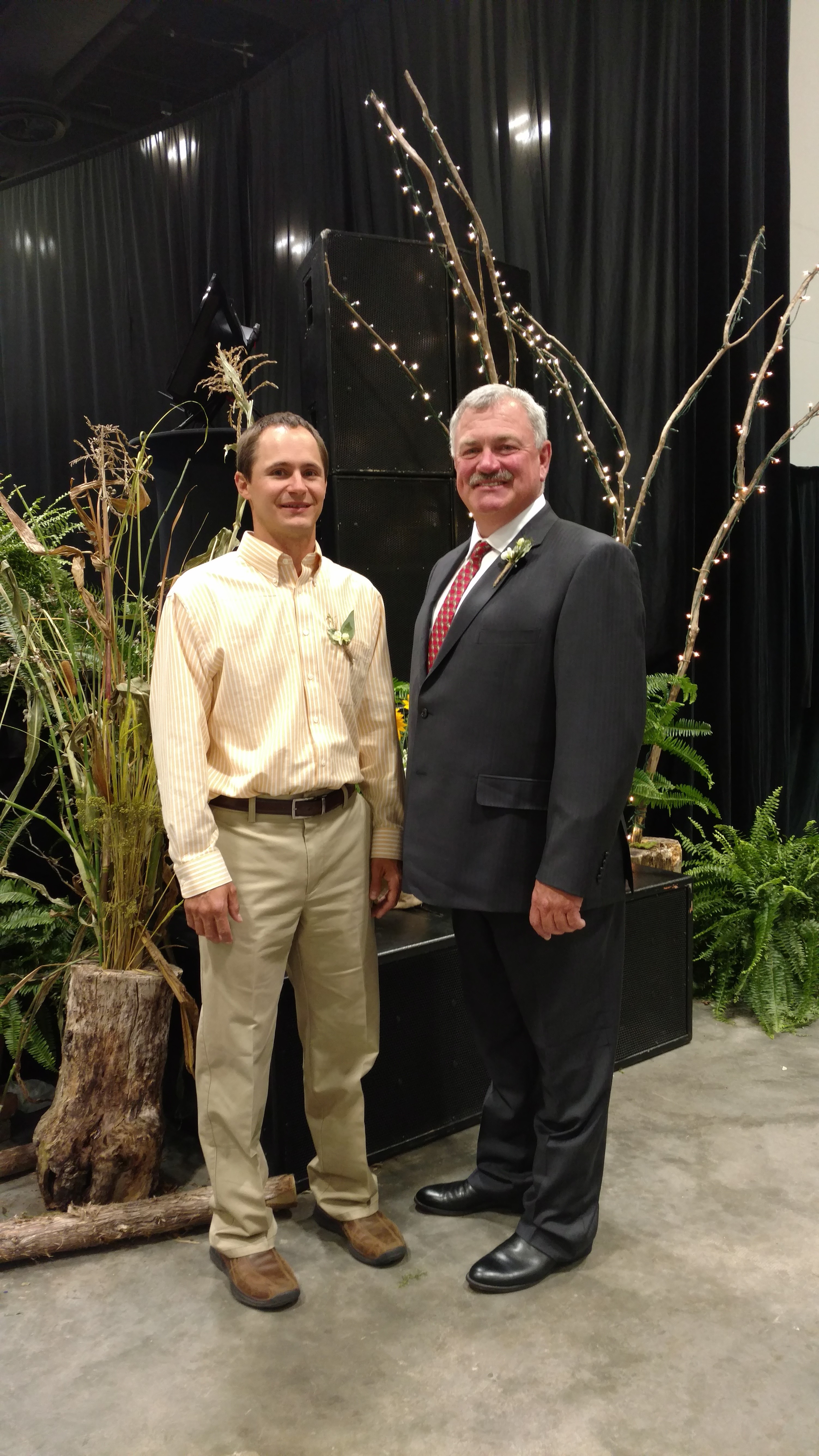 Sheldon Gerhardt (left), an Extension agent in Logan County, and Karl Hoppe, an area Extension specialist at the Carrington Research Extension Center, are honored for their work at the National Association of County Agricultural Agents' convention in Little Rock, Ark. (NDSU photo)