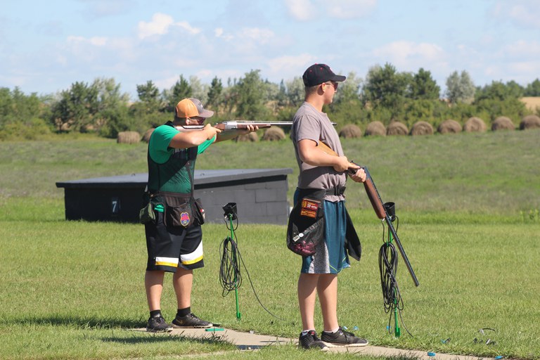 Ramsey County team members Dylan Durbin, left, and Bryer Erickson compete in the 2016 North Dakota 4-H Shooting Sports State Shotgun Match. (NDSU photo)