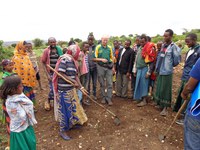 Kandel demonstrates the use of a long-handled hoe, brought from the U.S. to the Iftu village in Ethiopia. (NDSU Photo)