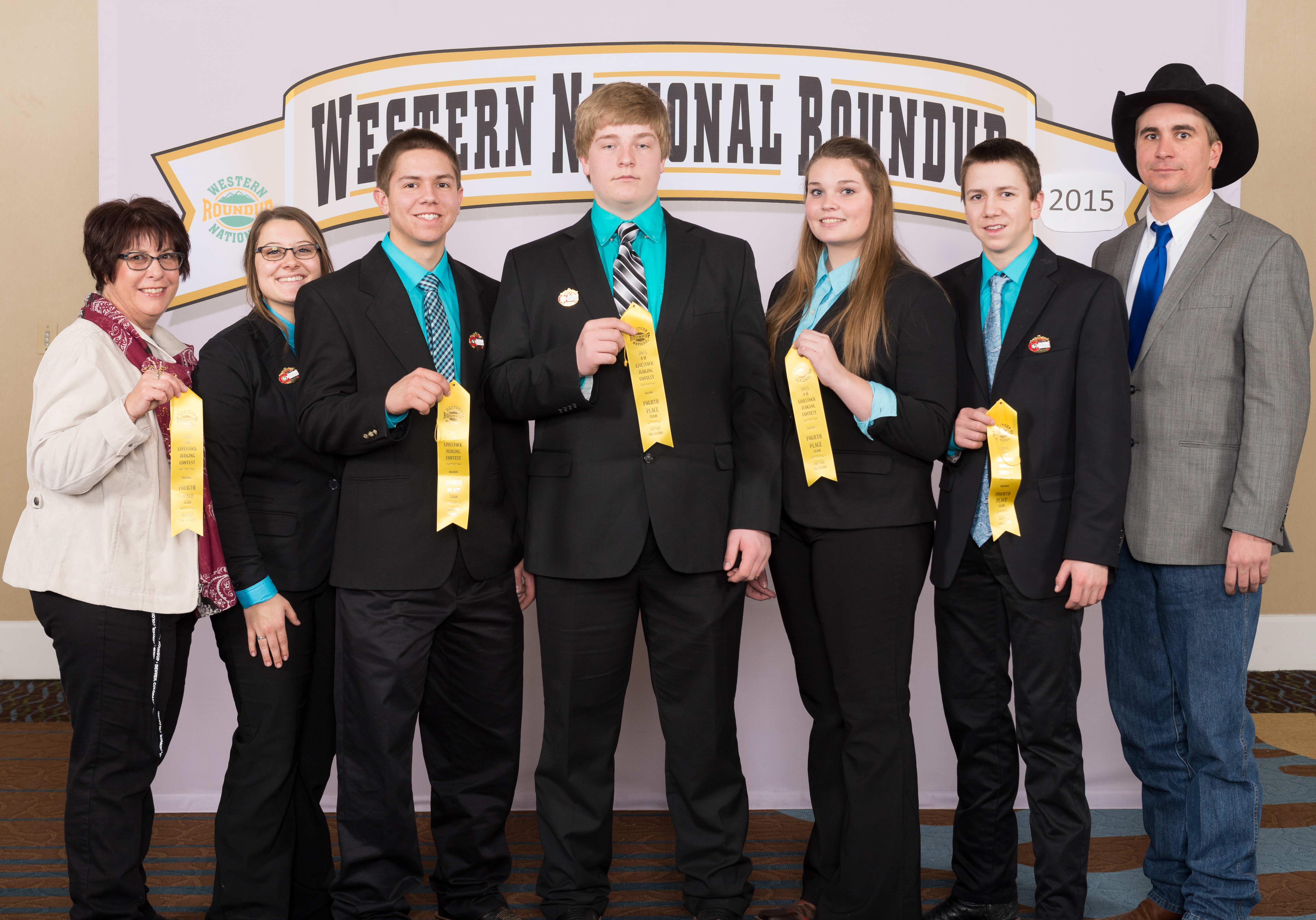 The Morton County livestock judging team places 11th overall at the Western National Roundup in Denver, Colo. Pictured are (from left): Jackie Buckley (coach), team members Kelsie Schaff, Jameson Ellingson, Conner Kaelberer, Sara Jochim and Stetson Ellingson, and Luke Keller (coach). (Photo courtesy of Western National Roundup)