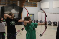 Youth compete at the 4-H Indoor Archery State Championship Match in Edgeley.