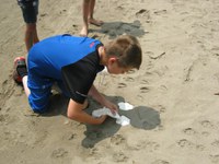 Cooper Stommen of Fort Rice makes a ""fossil"" as part of his outdoor adventures at the North Dakota 4-H Camp. (Stommen family photo)