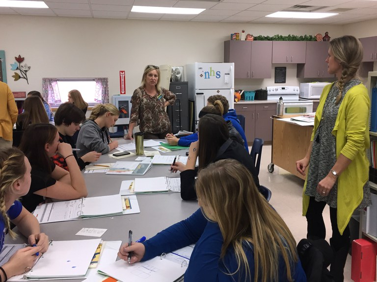 Sue Quamme, NDSU Extension 4-H youth development specialist (center) and Caroline Homan, an Extension agent from LaMoure County (right), work with youth during a Youth Lead Local event in Napoleon. (NDSU photo)