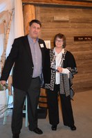 Kathleen Tweeten receives the Rural Leadership North Dakota Leader Award from Mike O'Keeffe, RLND Council chairman, during the RLND Class VII graduation gala. (NDSU photo)