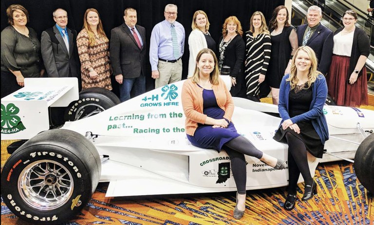 Several NDSU Extension agents and specialists attend the National Association of Extension 4-H Agents conference. Pictured are, standing, from left: Karla Meikle (agent, Morton County), Rick Schmidt (agent, Oliver County), Crystal Schaunaman (agent, McIntosh County), Brian Zimprich (agent, Ransom County), Ron Wiederholt (central district director), Penny Nester (agent, Kidder County), Dena Kemmet (agent, Mercer County), Caroline Homan (agent, LaMoure County), Meagan Scott (4-H youth development specialist), Brad Cogdill (chair, Center for 4-H Youth Development) and Amelia Doll (agent, Burleigh County); seated: Kimberly Fox (agent, Benson County) and Acacia Stuckle (agent, Emmons County). (NDSU photo)