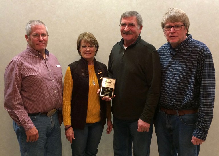 Mary and Gerald Jahner, center, receive the North Dakota Beef Cattle Improvement Association's 2017 Producer of the Year award from CHAPS manager Lee Tisor (left) and Kris Ringwall, NDSU Extension Service beef specialist and NDBCIA executive secretary. (NDSU photo)