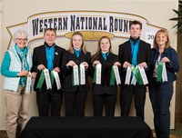 The Benson County horse judging team places fourth at the Western National Roundup in Denver, Colo. Pictured are, from left: coach Barb Rice; team members Jacob Arnold, Marit Wang, Ashton Wold and Will Rice; and coach Diane Randle. (Photo courtesy of Adam Warren Photography)