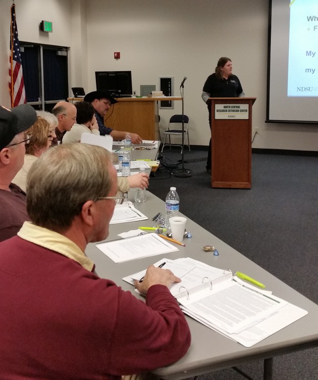 Paige Brummund, agriculture and natural resources agent in the NDSU Extension Service's Ward County office, speaks to participants at a Design Your Succession Plan workshop. (NDSU photo)