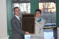 Shelly Swandal, NDSU Agribusiness and Applied Economics Department student services and advising director, receives the John Lee Coulter Agribusiness Award from Dahltin Paul, president of the NDSU Agribusiness Club. (NDSU photo)