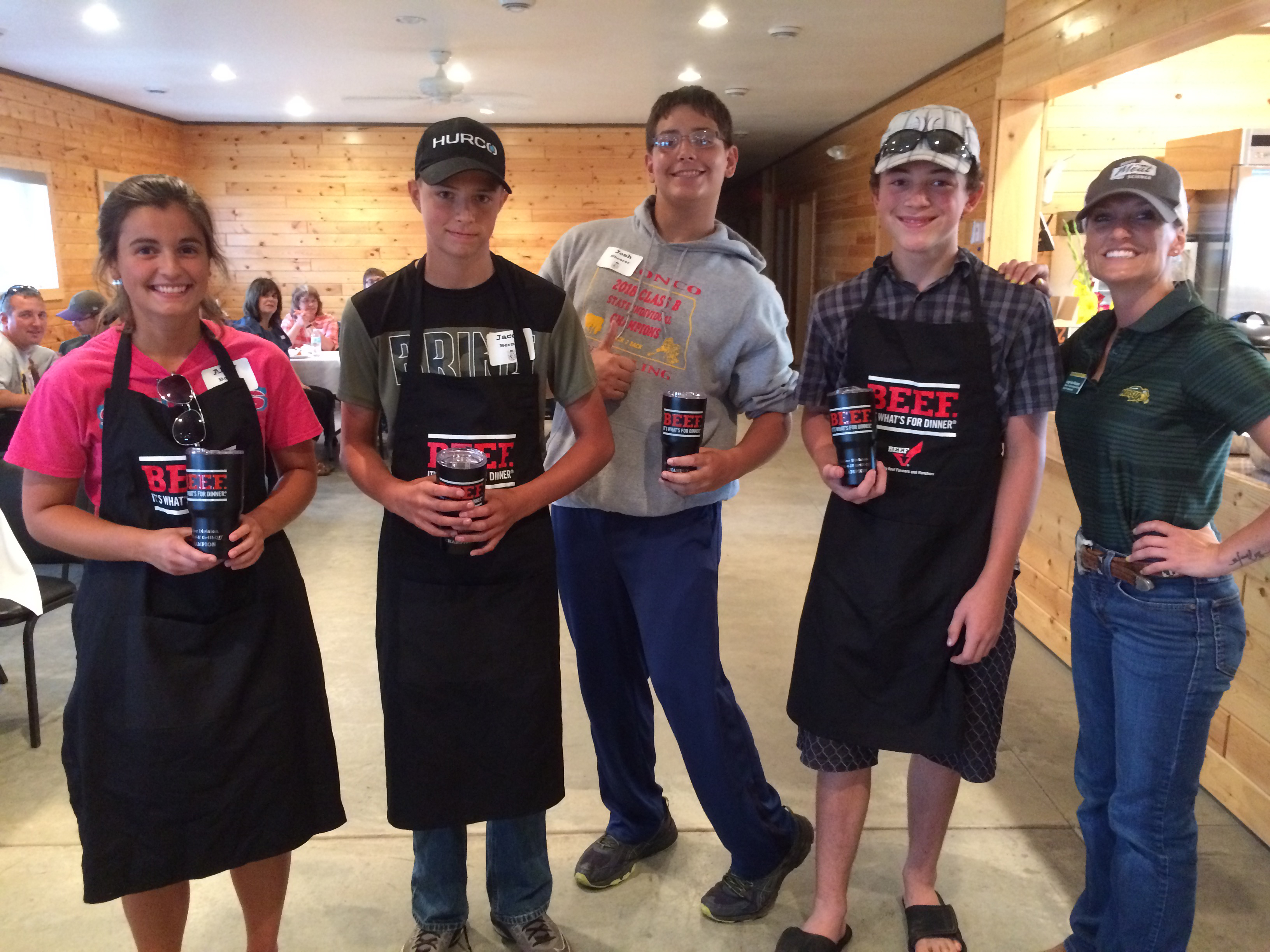 A Richland County team places first in the junior division of the 4-H Grill-off. Pictured are (from left): team members Abby Boelke, Jacob Berndt, Josh Shearer and John Kuruc, and Leigh Ann Skurupey, NDSU Extension 4-H youth development specialist for animal sciences. (NDSU photo)