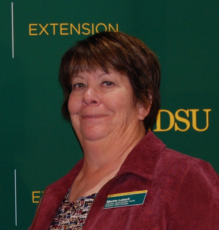 Macine Lukach receives the AGSCO Excellence in Extension Award. (NDSU ...