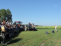 Visitors learn about crop research during a field tour at the North Central Research Extension Center. (NDSU photo)